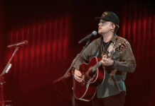 
			
				                                Kenansville native Wesko (Wesley Holmes) performs his original song, ‘Helene,’ in front of a crowd of 80,000 during the Concert for Carolina at Charlotte’s Bank of America Stadium on October 26. Wesko co-wrote the song with his friend J.D. Williamson about a week after the hurricane devastated Western North Carolina. (Courtesy photo:Wesko)
 
			
		