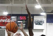 
			
				                                Spring Creek senior Heather Alexander blocks a shot from behind while teammate Trinity Daniels (12) defends during a game last season. The Gators start their 2024-25 season Tuesday at North Lenoir. (Rudy Coggins|mountolivetribune.com)
 
			
		