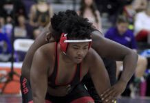 
			
				                                Southern Wayne heavyweight Bryce Sanders waits for the restart during second-period action against Corinth-Holders’ Clifton Allen. (Rudy Coggins|mountolivetribune.com)
 
			
		