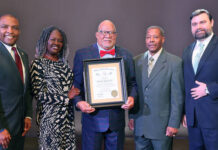 
			
				                                Apostle Dr. Norbert Simmons, center, has been awarded The Order of the Long Leaf Pine, the state’s highest honor. Left to right are, Congressman Don Davis of Snow Hill who presented the honor; Simmons’ wife Gwen; Simmons; Mount Olive Mayor Jerome Newton; and Goldsboro Mayor Charles Gaylor. Simmons, a Mount Olive native, is the founder of Deeper Life Church Ministries in Goldsboro. (Contributed photo)
 
			
		